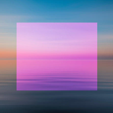 SUNSET 1 (PINK): A long exposure photograph captures a beautiful pink and blue sunset over a still, tranquil ocean. The colors of the sky are reflected in the water, creating a sense of peace and serenity.