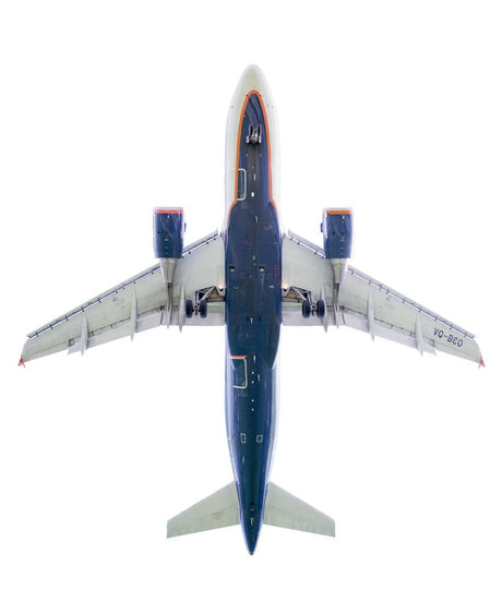 PLANE 400: An airplane with its landing gear extended is captured in mid-air, against a plain white background. The plane is viewed from directly below, showcasing its underside, including the landing gear, wings, and tail.