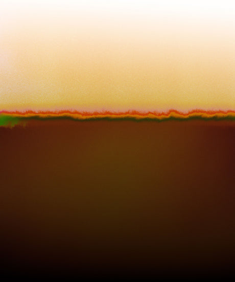 CANDY'S DRIFT: A digital abstract photograph showcasing a sunset horizon with a gradual color transition from a bright yellow at the top, fading to orange and red in the middle, and then transitioning to a dark brown at the bottom. The photograph features an abstract, painterly texture and evokes a sense of calm and tranquility.