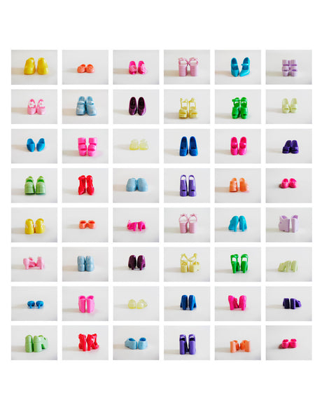 EXCESSIVE: A grid of colorful plastic doll shoes arranged on a white background. Each row and column features a different color of shoes, with multiple variations in style. The shoes are all in pairs, and some are slightly different in shape or size. This image showcases a variety of vibrant and playful footwear for doll play.