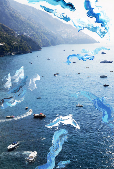 BLUE VIEW AMALFI: An aerial view of the Bay of Naples, Italy, with a multitude of boats traversing the blue water. The scene is overlaid with abstract, blue and white paint strokes. The image captures the beauty of the natural landscape and the artistic expression of the superimposed paint.