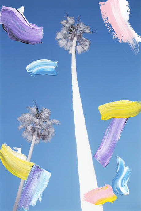 LA 2015: This image features two palm trees against a bright blue sky. The trees are white and gray, and the sky is dotted with colorful paint strokes. The image creates a sense of playful and artistic energy, capturing a moment of carefree sunshine.