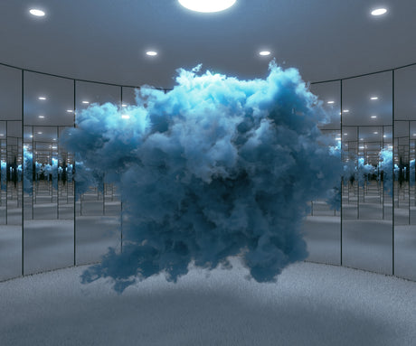 CONTEMPLATIVE CLOUD BLUE: A large blue cloud hangs in the center of a room with mirrored walls and a white ceiling. Multiple white ceiling lights illuminate the cloud and room.