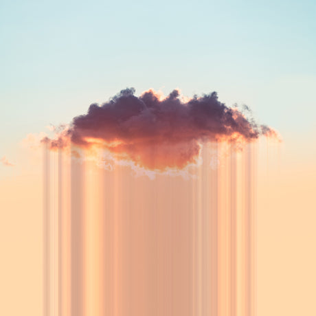 ACID RAINDROPS: A single dark cloud in a pastel blue sky is illuminated with warm orange light from the setting sun. Vertical streaks of light stretch down from the cloud, creating a surreal and captivating scene.