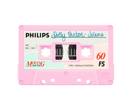 DOLLY PARTON JOLENE: This image shows a pink Philips cassette tape, a vintage format for recording and playing music, with a label that states Dolly Parton - Jolene. The tape is designed for normal position playback and has a 60-minute capacity. The cassette is in pristine condition, suggesting its likely never been used or is a collectors item.