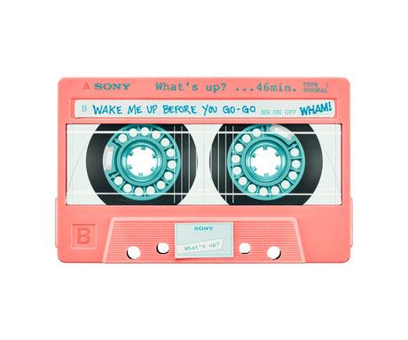 WHAM: A close-up shot of a pink Sony audio cassette. The cassette has a white label with the song title Wake Me Up Before You Go-Go written in black marker. The cassette is lying flat on a white background.