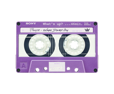 WHEN DOVES CRY: A close-up image of a purple Sony cassette tape with the song When Doves Cry by Prince on side A. The tape is labeled Whats Up and has a 46-minute running time.