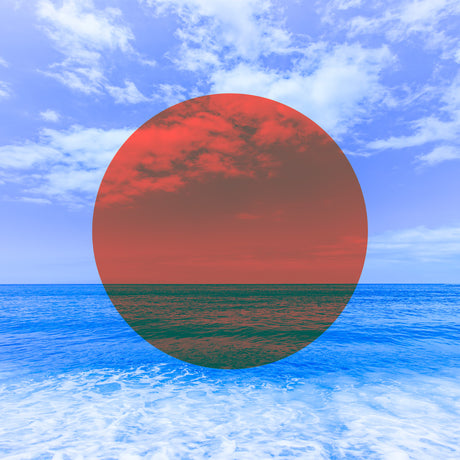 DREAM SEASCAPE: A red circle representing a sunset is superimposed over a blue ocean with white clouds and waves. The sunset circle fills most of the image and includes some dark clouds, while the ocean water below it appears more blue.