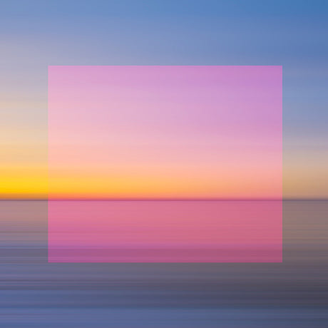 PINK DAWN: A blurred, abstract photograph of a sunset over a body of water. The sky is a gradient of pink, yellow, and blue. The water is a mix of pink and yellow, with a slight blur. The image has a dreamy, ethereal feel.