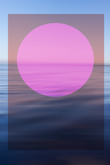 SEASCAPE AND PINK CIRCLE: An abstract image of a pink sunset over blurry water with a large pink circle in the middle of the frame. The sunset colors are soft and pastel, and the water looks like it is moving quickly. The image is a beautiful and abstract representation of a sunset.