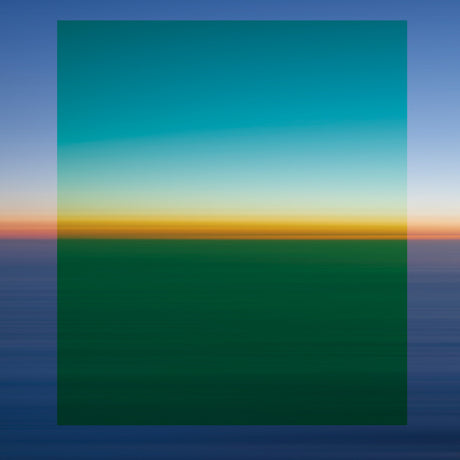 SUNSET 2: An aerial view of a stunning sunset, with a vibrant yellow horizon and a deep green sky. The colors are muted and blend seamlessly, creating a sense of calm and serenity.