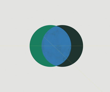 ECLIPSE 10: An abstract image featuring three overlapping circles in shades of blue, green, and black. The circles are set against a plain white background, creating a simple yet striking visual.