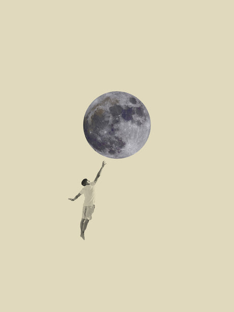 TO THE MOON: This digital collage artwork depicts a man in a white shirt and shorts reaching upwards towards a large, grey moon. The background is a simple, light beige color, and the image appears to be a surrealist piece, implying that the man is attempting to grasp the moon.