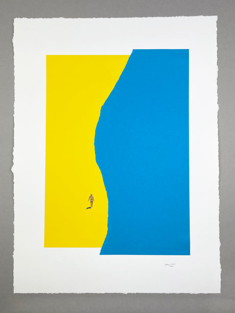 by THE sea: A minimalist print depicting a single person walking on a yellow sand beach against a deep blue ocean. The figure is small, emphasizing the vastness of the landscape. The simple composition and bold colors create a striking and evocative image.